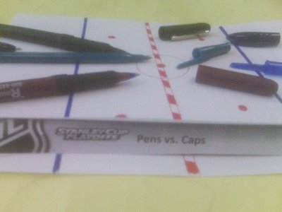pens_vs_caps__2_.JPG