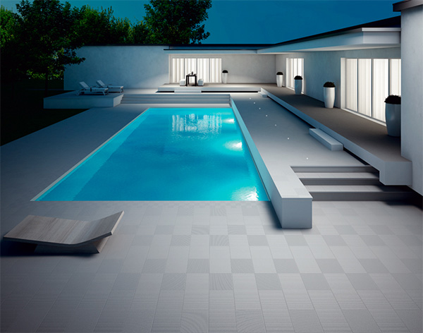refin_outdoor_tile_x_stone_around_pool_application.jpg