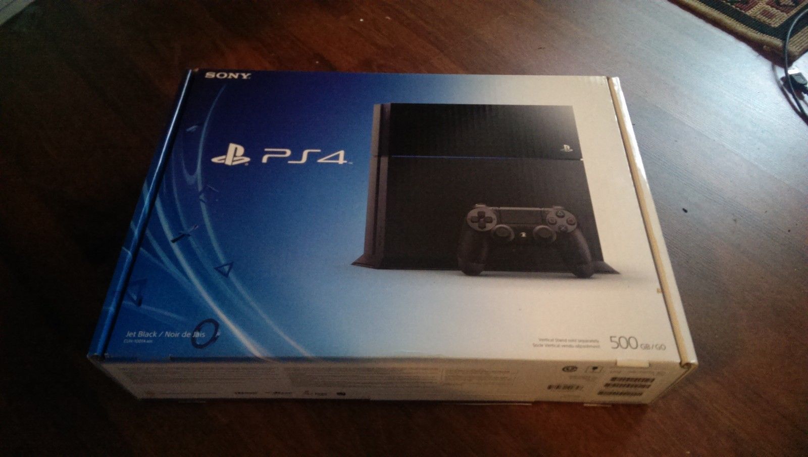Sony_Playstation_4_PS4_Console_500_GB_Jet_Black_Brand_New_w_Extra_Controller_300_USD52bd5e42940cb5d0f3b4.JPG