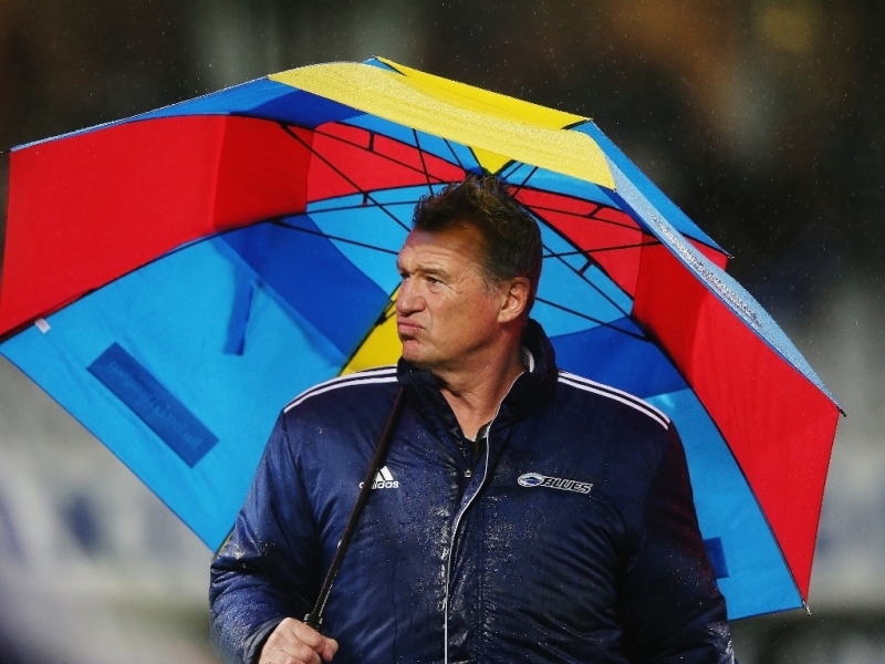 Sir_John_Kirwan_holding_umbrella.jpg