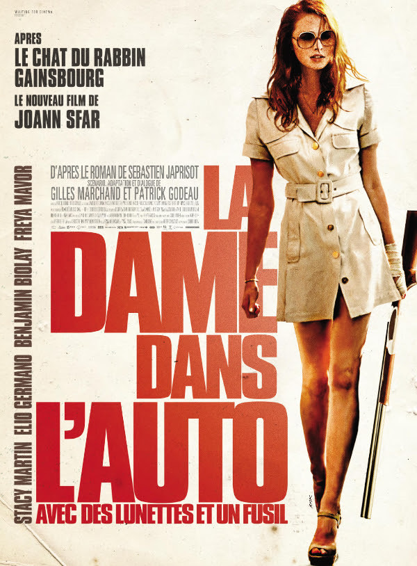la_dame_dans_l_auto_avec_des_lunettes_et_un_fusil.jpg