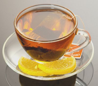 400_hot_tea_with_lemon_in_glass_cup_saucer.jpg