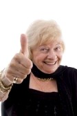 3892130_happy_old_woman_showing_thumb_up_on_an_isolated_background.jpg