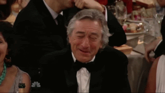 Robert_DeNiro_Laughing_Awards_Ceremony.gif
