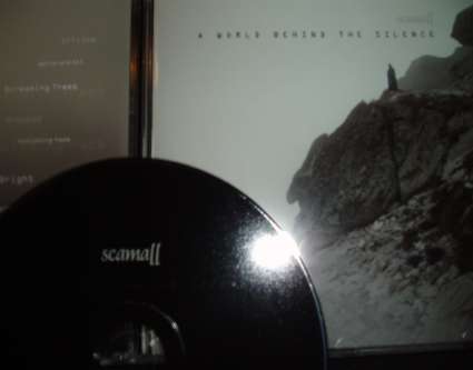 00_scamall_a_world_behind_the_silence__gencd008__cd_2009_proof.jpg
