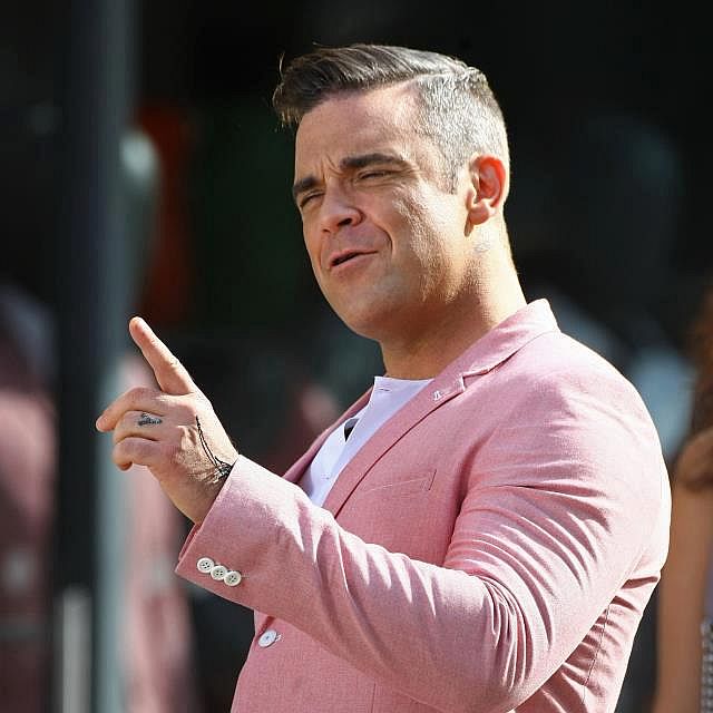 Watch_the_official_music_video_for_Candy_by_Robbie_Williams_single_song_track_release_2012_music_scene_ireland.jpg