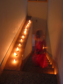 Grace_20in_20stairway_20w_20candle.jpg