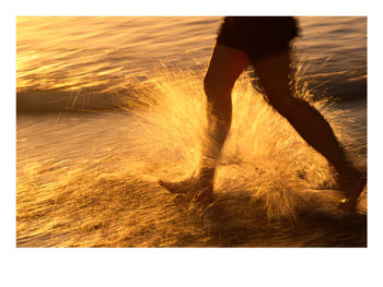 108308_Close_View_of_a_Runners_Legs_Splashing_Through_the_Surf_Posters.jpg