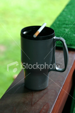ist2_878394_coffee_mug_and_a_cigarette.jpg