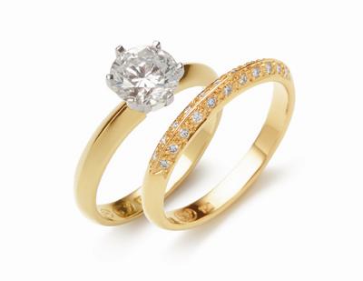 gold_solitaire_engagement_wedding_ring_set_pair.jpg