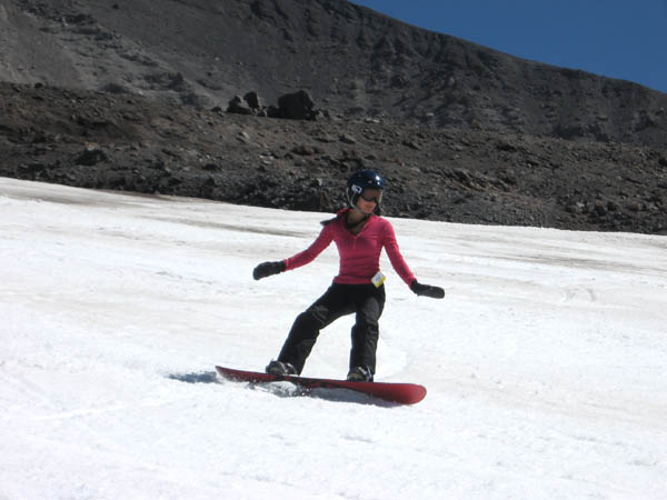 adult_snowboard_girl_carving_it_up.jpg
