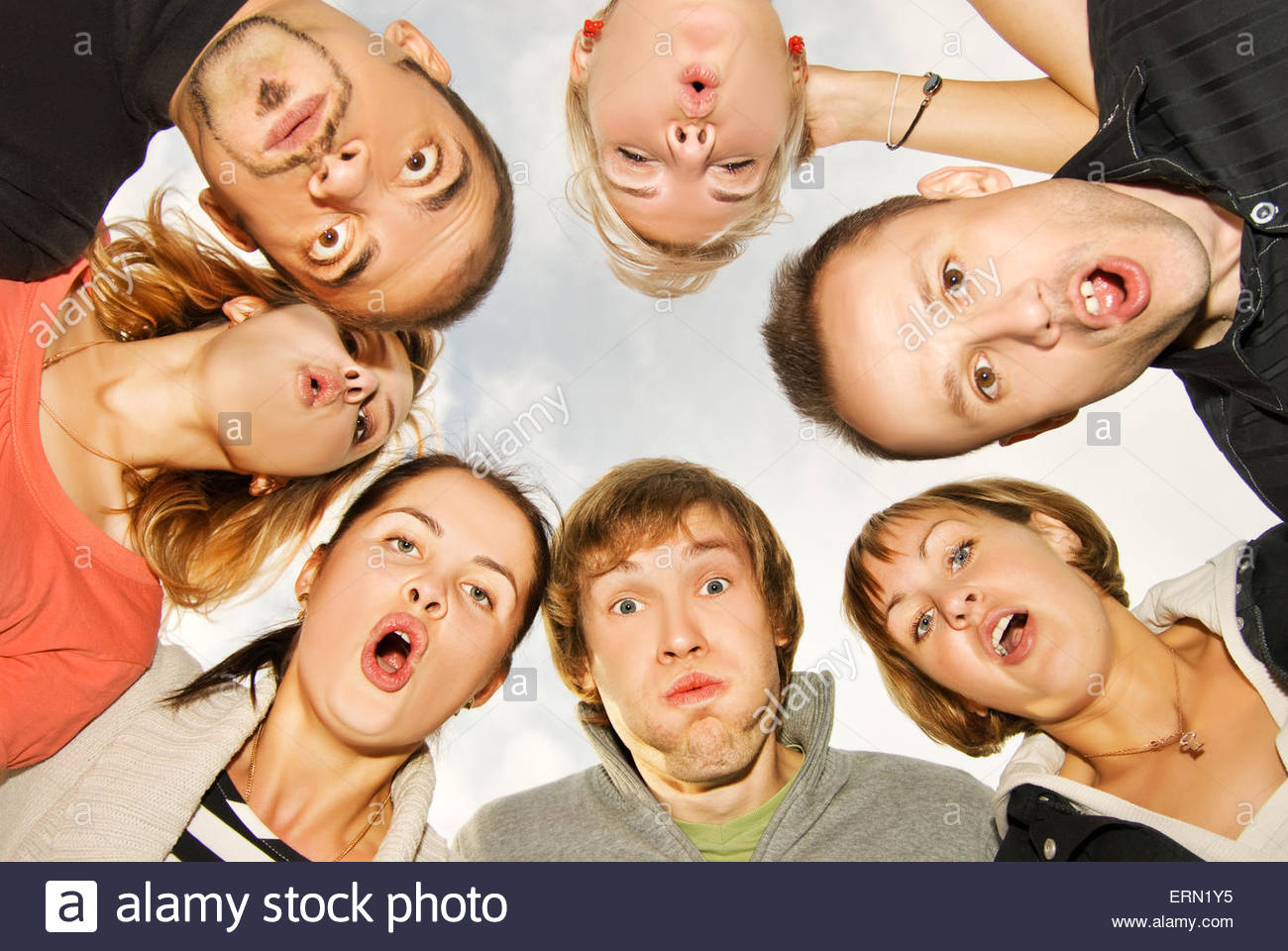 group_of_happy_friends_making_surprised_faces_ERN1Y5.jpeg
