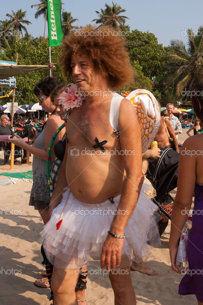 depositphotos_29609313_An_unidentified_man_goes_in_Funny_angel_costume_at_the_annual_festival_of_Freaks_Arambol_beach_Goa_India.jpg