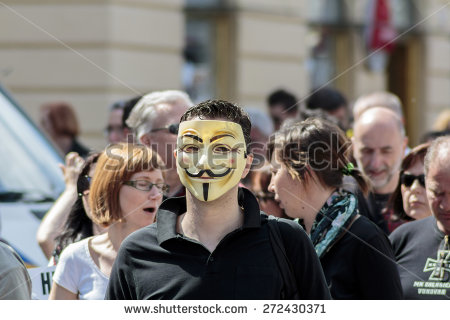 stock_photo_zagreb_croatia_april_man_wearing_anonymous_mask_during_a_protest_against_rising_272430371.jpg