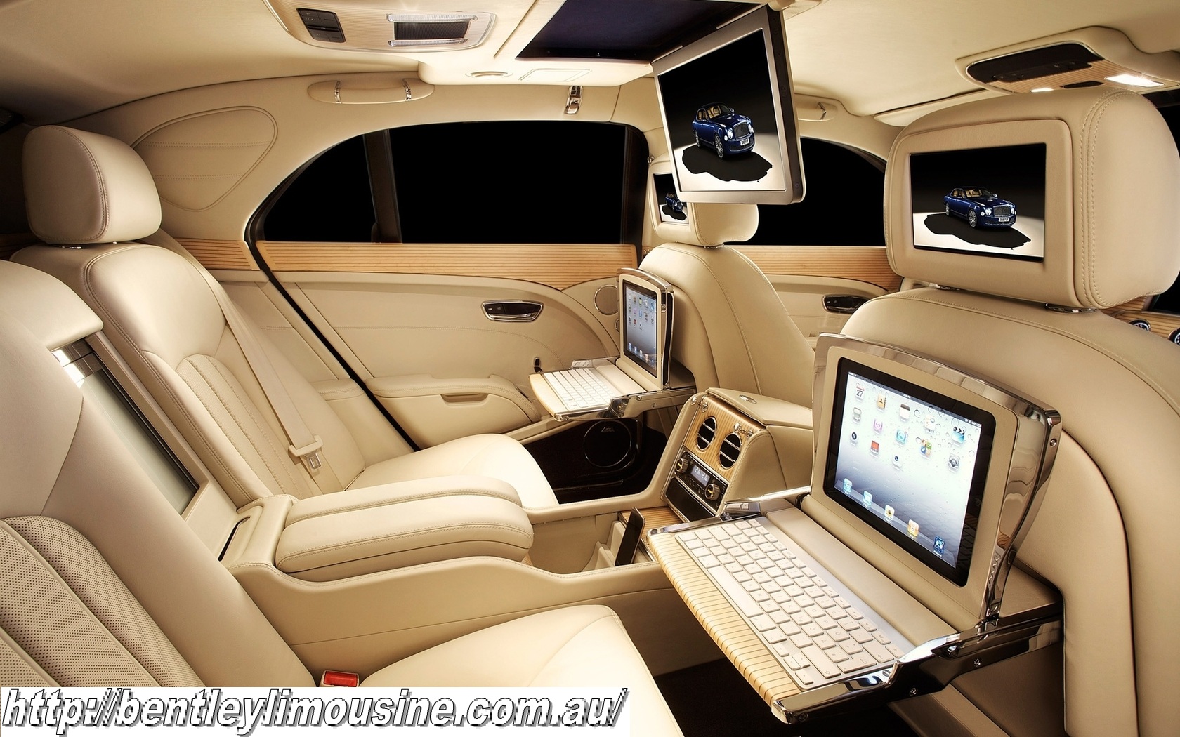 373929_bentli_mulsan_sedan_limuzin_salon_interer_kompyute_1680x1050_www_gdefon_ru.jpg