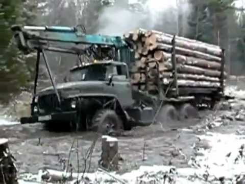 like_a_boss_fully_loaded_logging_10_wheeler_plows_through_the_mud.jpg