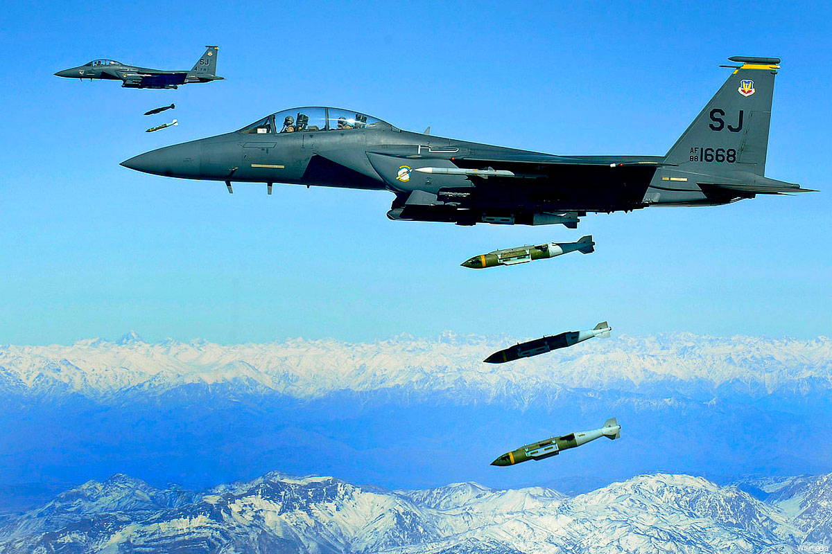 us_fighter_f15_jets_dropping_smart_missles_bombs_in_afghanistan.jpg