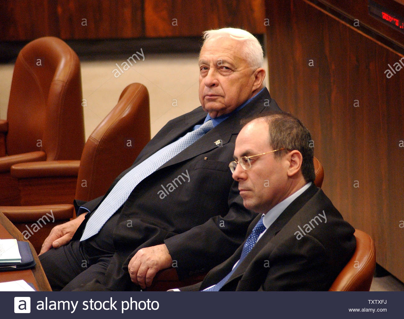 israeli_prime_minister_ariel_sharon_listens_to_a_debate_in_the_knesset_the_israeli_parliament_on_his_disengagement_plan_to_separate_from_the_palestinians_in_gaza_and_the_west_bank_march_15_200_jerusalem_israel_upi_photodebbie_hill_TXTXFJ.jpg