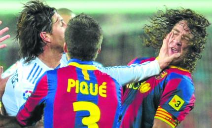 sergio_ramos_vs_puyol.jpg