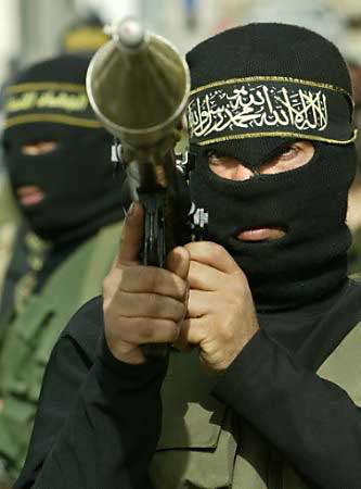pal_20militant_20w_20weapon_20at_20funeral.jpg