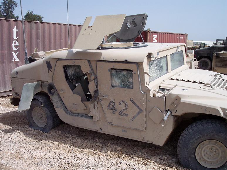 Armored_20Humvee_20hit_20by_20RPG.jpg