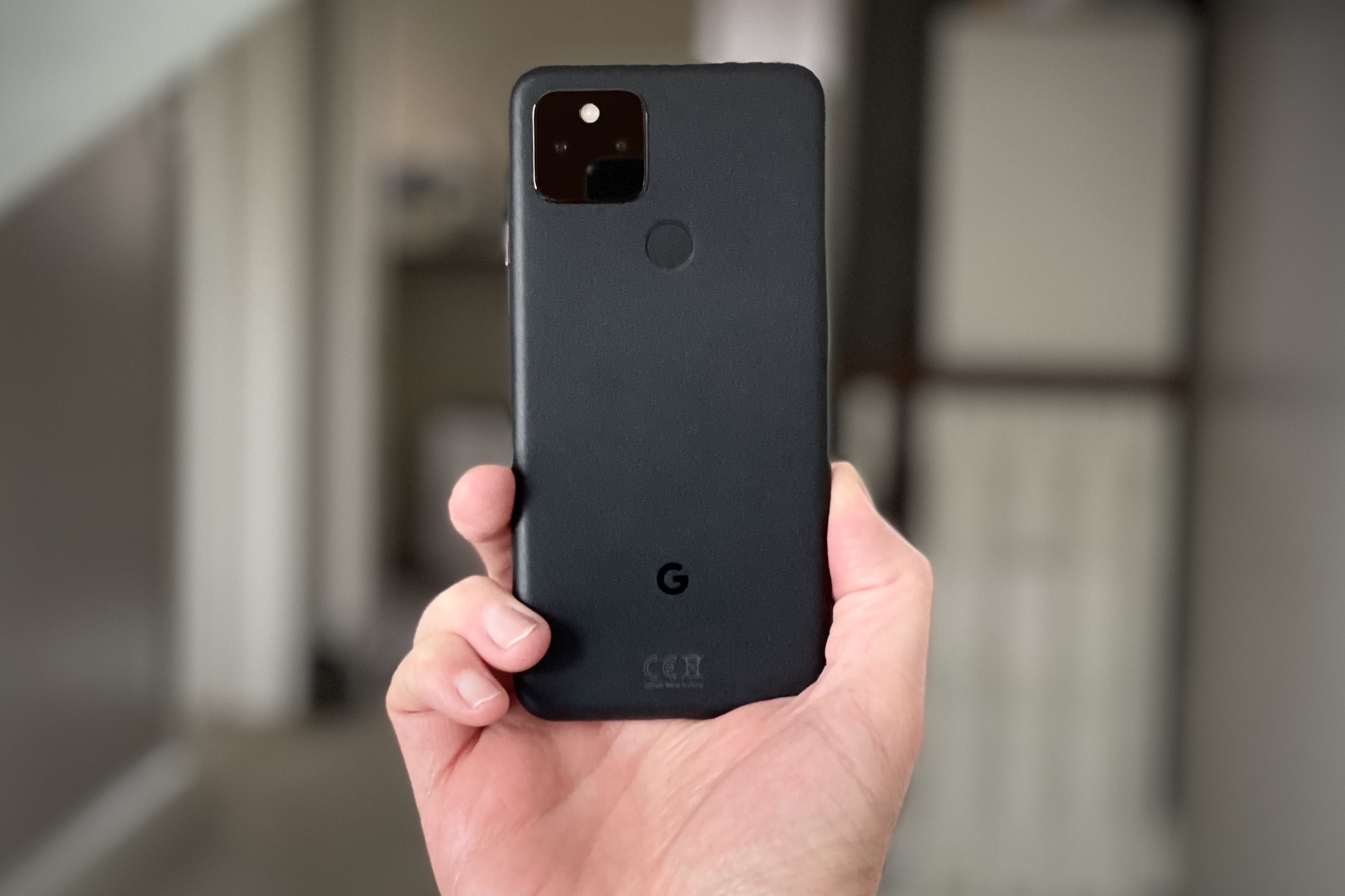 google_pixel_5_back_black_hand.jpg