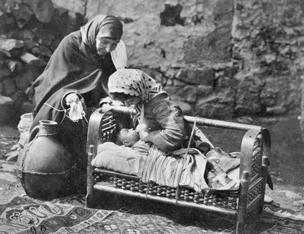 Georgian_woman_with_newborn._Georgia._The_Georgians._Photographer_D.A._Nikitin._1881..jpg