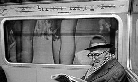 An_older_man_reading_a_ne_001.jpg