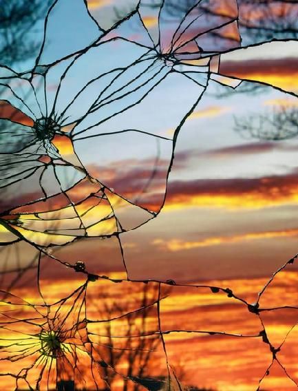 Broken_mirror__sunset_reflection.jpg