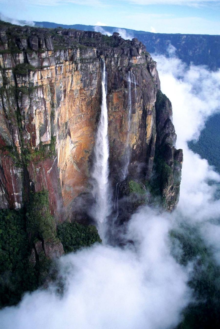 Angel_Falls___the_highest_of_all_the_waterfalls_in_the_world__which_is_located_in_the_tropical_forests_of_Venezuela__Canaima_National_Park._The_waterfall_is_named_after_the_American_pilot_James_Angel..jpg
