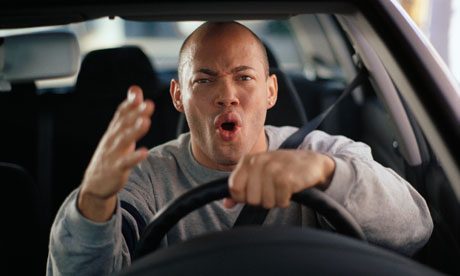Man_driving_with_road_rag_008.jpg