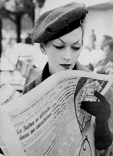 DOVIMA_August_1955_Wearing_a_hat_and_suit_by_Christian_Dior._Photographed_by_Richard_Avedon_at_Fouquet__s__Paris..jpg