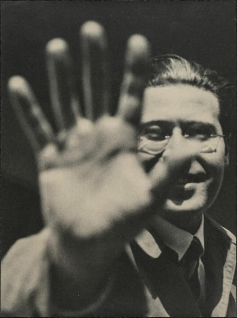 Laszlo_Moholy_Nagy_photograph_self_portrait_with_hand_1925_1929_763x1024.jpeg
