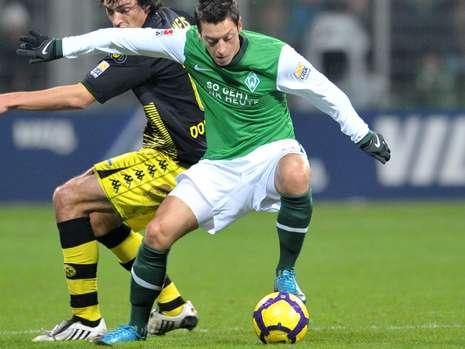 mesut_oezil_13956126_mbqf_templateId_renderScaled_property_Bild_height_349.jpg