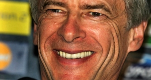 arseneWengeHappyArsenalManager.jpg
