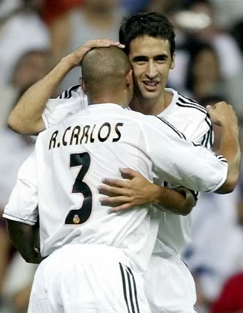 xinsrc_0f69d9f5d95d11d7b21c000103134420_carlos_raul_hug_350.jpg