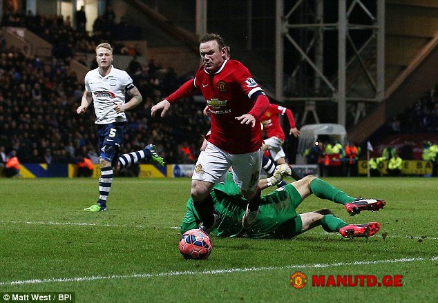1424242655_25bfadb200000578_2956329_rooney_went_down_moments_after_and_several_of_the_preston_player_a_1_1424131501242.jpg