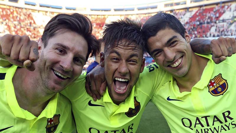 Messi_Neymar_and_Suarez_The_amazing_trio_of_Barcelona_celebrating_the_Spanish_Title_2014_2015.jpg