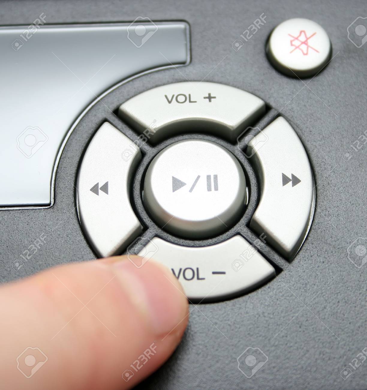 490306_finger_turning_volume_down_focus_on_buttons.jpg