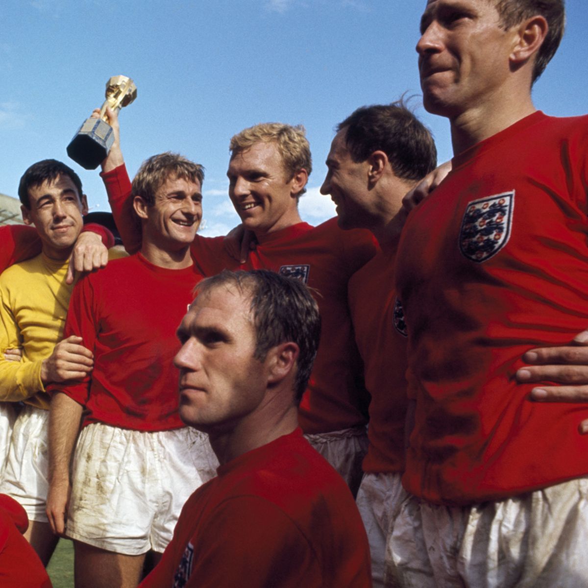 The_victorious_England_team_celebrate_with_the_Jules_Rimet_Trophy.jpg