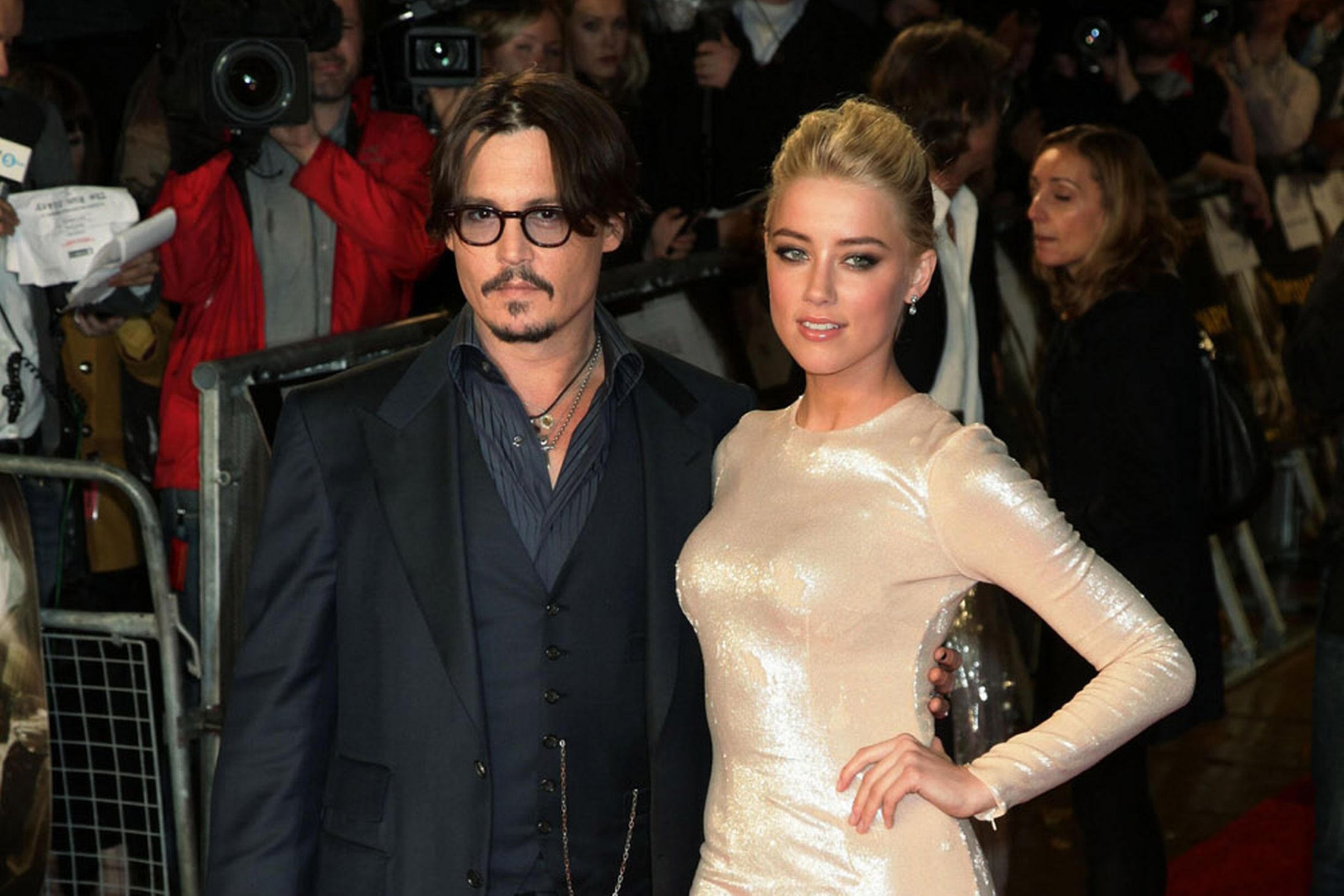 Johnny_Depp_and_Amber_Heard_arriving_for_the_European_Premiere_of_The_Rum_Diary__at_Odeon_Kensington_in_West_London_943085.jpg