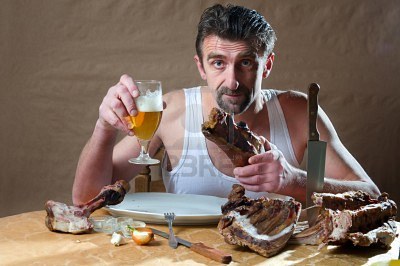 8956855_man_eating_smoked_pork_meat_and_drinking_beer.jpg