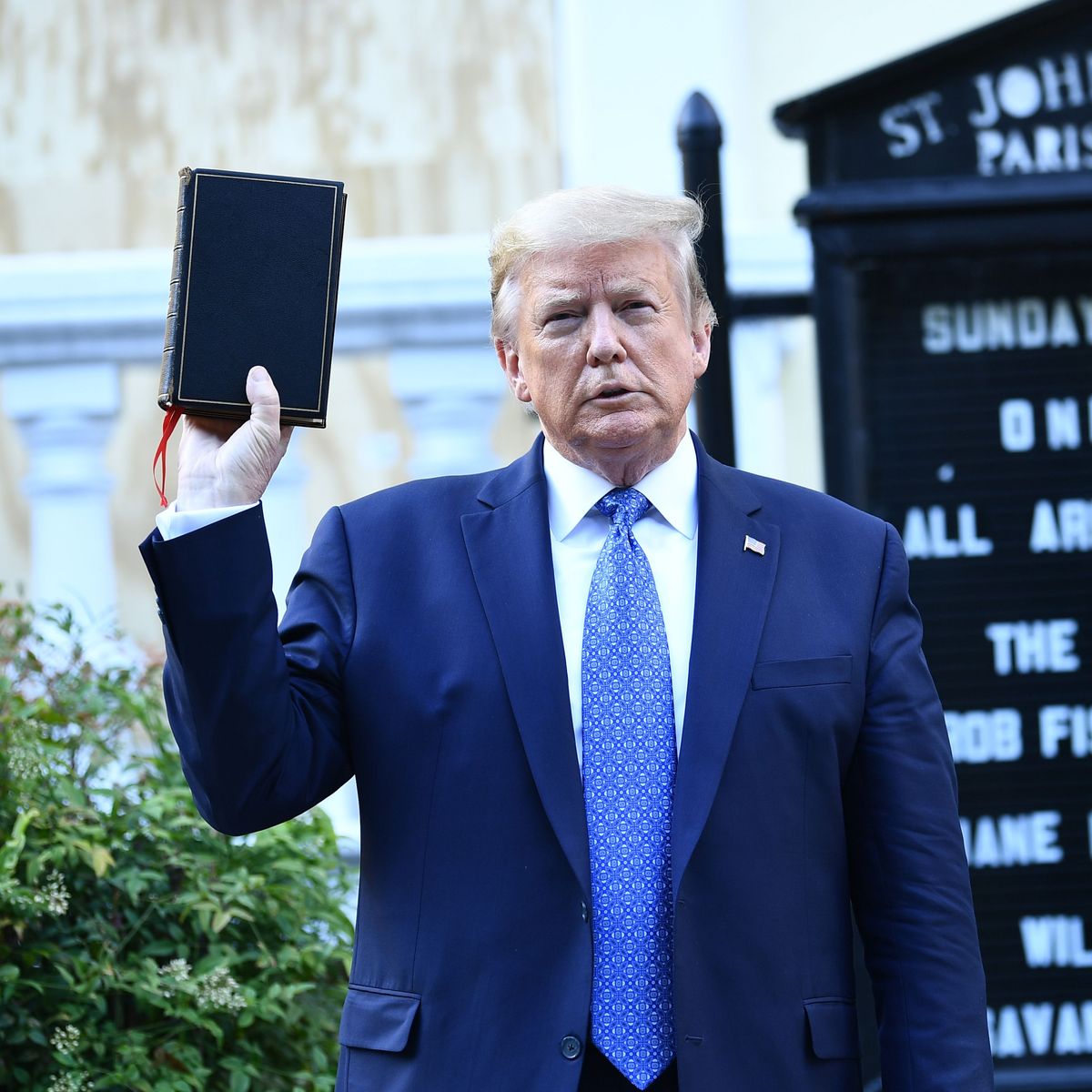 5e4627443c3abec9eb35dfaa7cf1c3e01c_trump_with_bible_dc_protests.rsquare.w1200.jpg