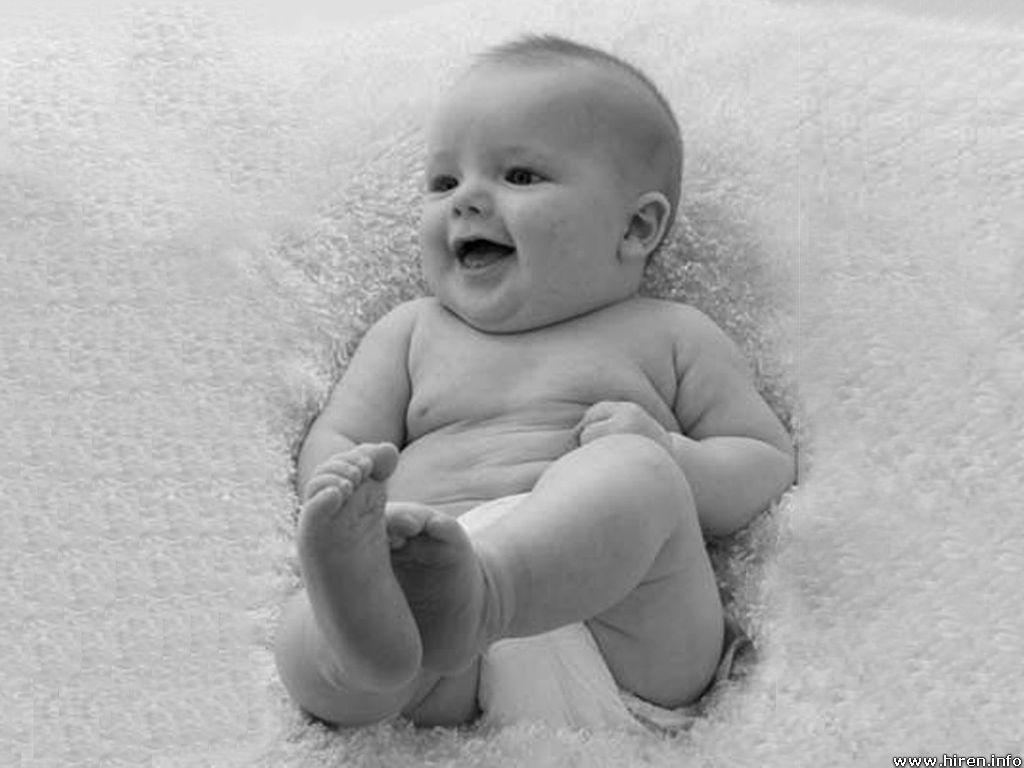cute_and_cuddly_baby_laughing.jpg
