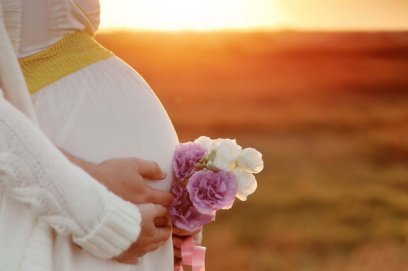FreeGreatPicture.com_50636_pregnant_women_with_flowers.jpg